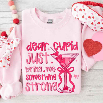 Dear Cupid Something Strong Sweatshirt – Funny Valentine’s Day Sweatshirt